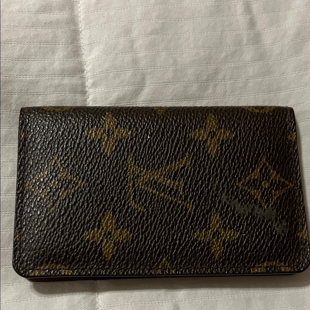 Louis Vuitton Brown and Gold Monogram Card Holder can be for unisex.